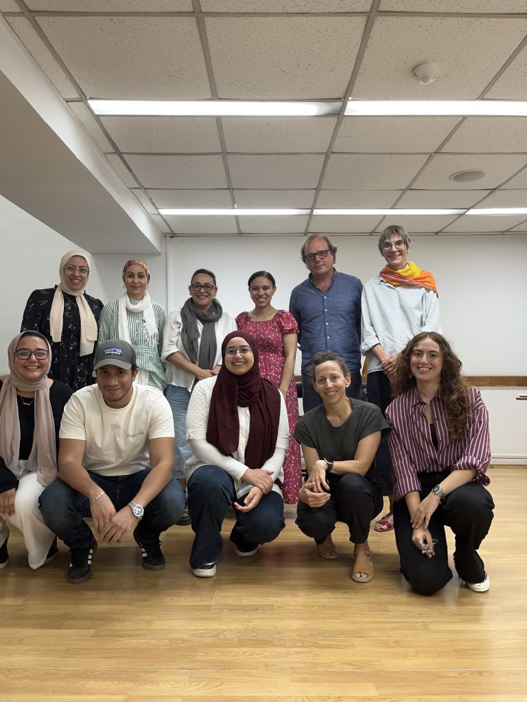 Participants of the Experimenting with Urbanity workshop pose for a group photo in the seminar room